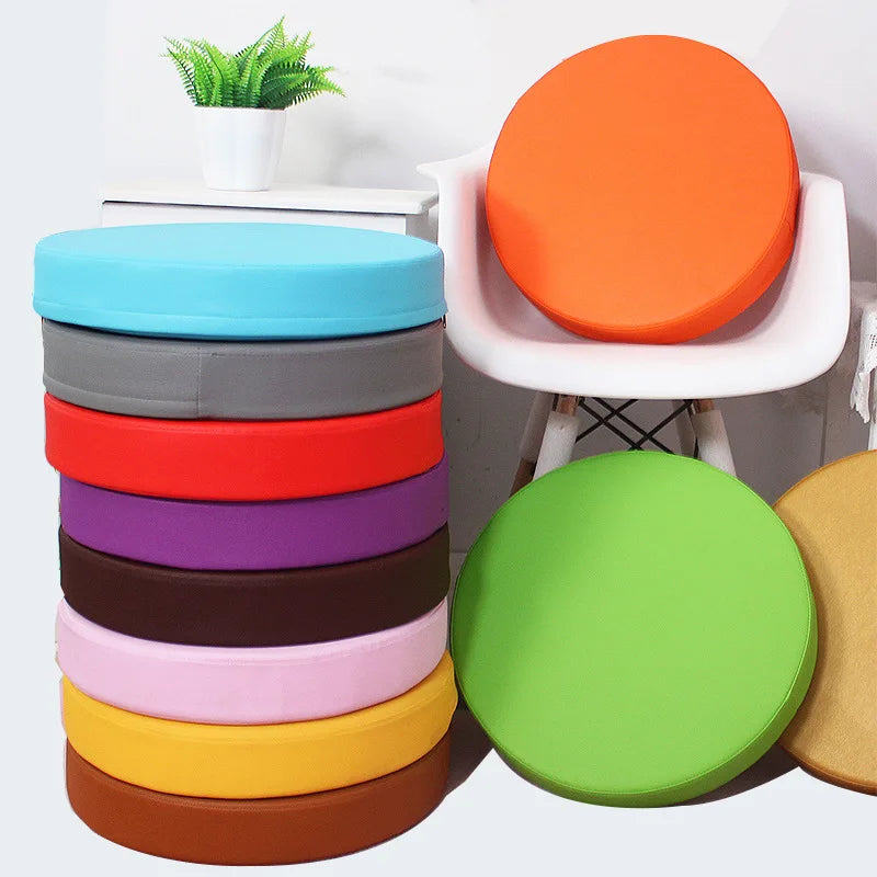 Colorful stack of THE MUSCLE SHOP meditation cushions for ultimate comfort and support in meditation practice